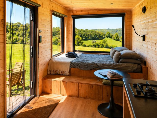 The bedroom with a view over the fields